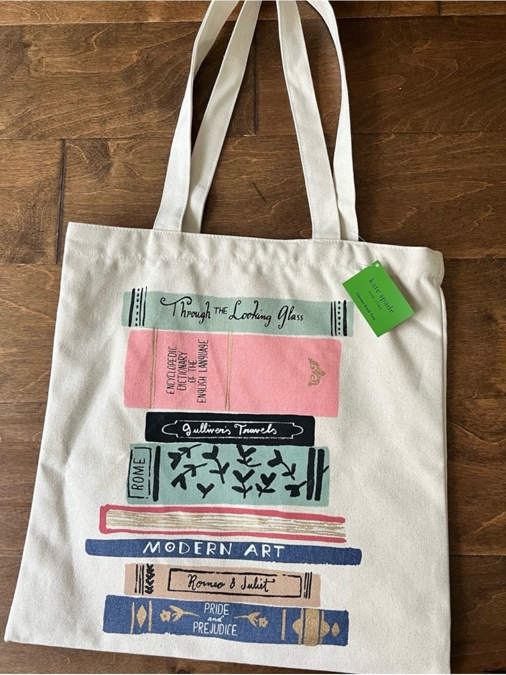 kate spade Cream Canvas Tote with Pink, Teal, Navy & Blue Book-Stack Print